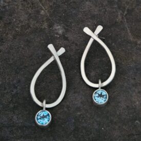 Swiss Blue Topaz Criss Cross Earrings.jpg